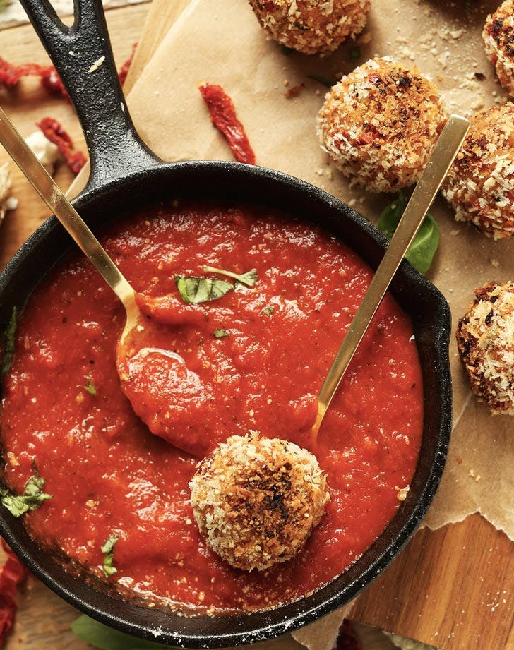 sundried tomato basil arancini is a delicious dish for your vegan wedding, even carnivore guests will love them