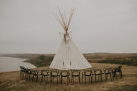 The ceremony space was done with a large 20ft teepee and chairs placed around it