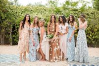 bridesmaids in floral and solid dresses