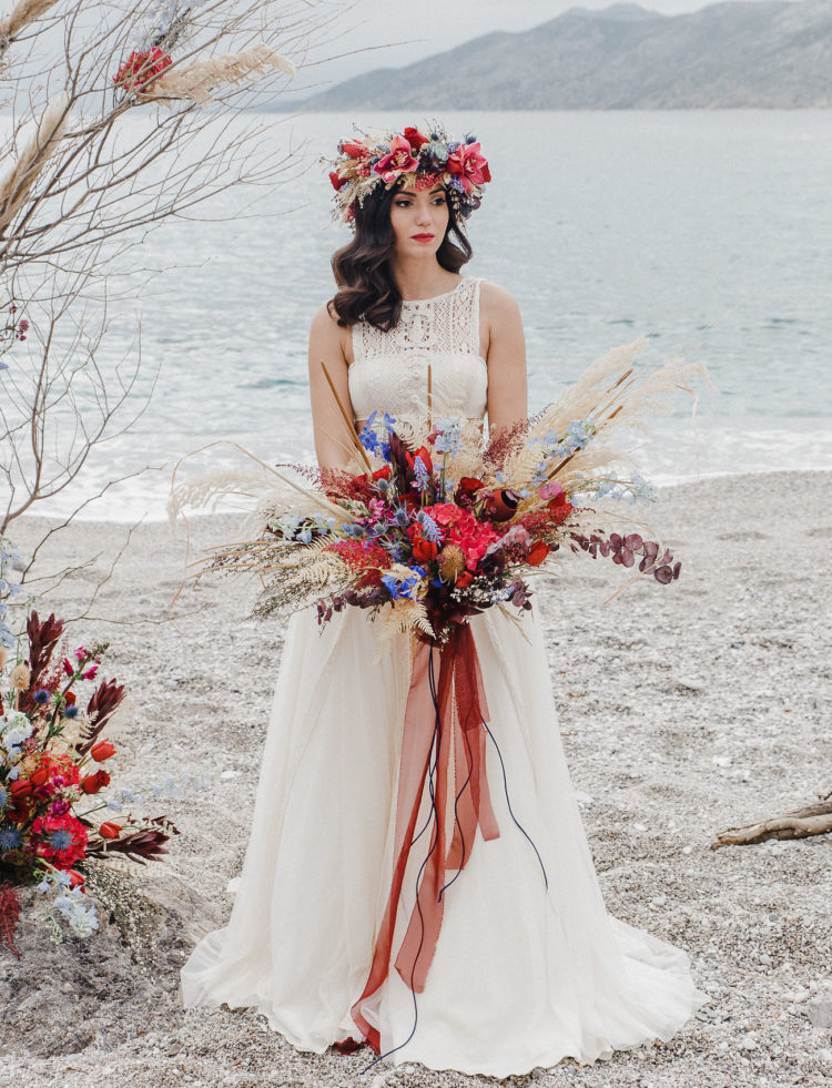 She finished off her look with a bright floral crown that matched the bouquet