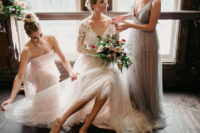 04 The bridesmaids were wearing powder blue and blush mismatching dresses and top knots to create ballet dancer-inspired looks