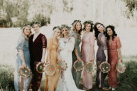 05 The bridesmaids were wearing mismatching maxi dresses and were holding tambourines with embroidery