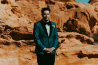 05 The groom was wearing a teal tuxedo with black lapels