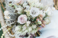 06 The wedding bouquet was done in neutrals and blush and lavender