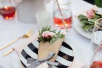 06 a pretty tablescape with pink blooms and stripes plus gold cutlery for a cozy shower