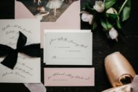 07 The wedding invitation suite was done in blush and white with black calligraphy