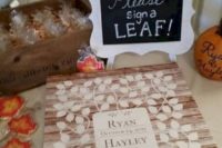 07 a pallet sign with leaves that are to be signed using a marker is a classic rustic idea