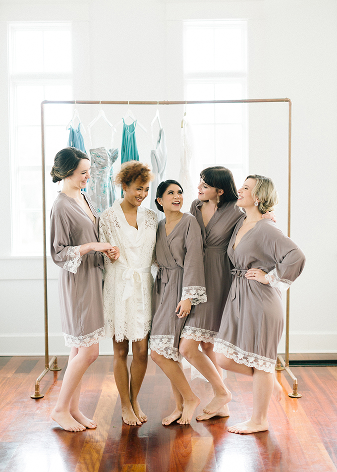 Some matching bridesmaid robes and bags