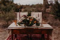 08 The centerpiece was a lush floral one, with bright orange, yellow and burgundy blooms and pampas grass