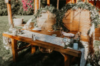 gorgeous bohemian sweetheart table decor