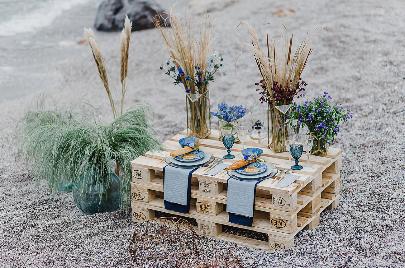 The wedding reception space was done with a pallet table and blues