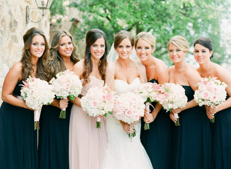 black strapless maxi gowns with draped bodices and a matching blush one for the maid of honor