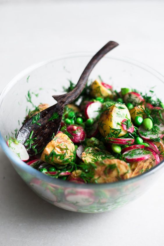 vegan spring potato salad with asparagus, peas, radish and a sharp mint and dill dressing