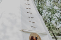 10 For the honeymoon, the couple stayed at an oversized teepee in one of the sacred parks