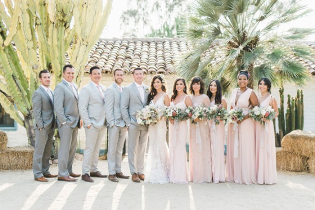 The bridesmaids were wearing blush and the groomsmen were wearing grey suits