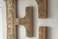 11 a wooden monogram signed by the guests can be used as an artwork, this is a cool and functional idea