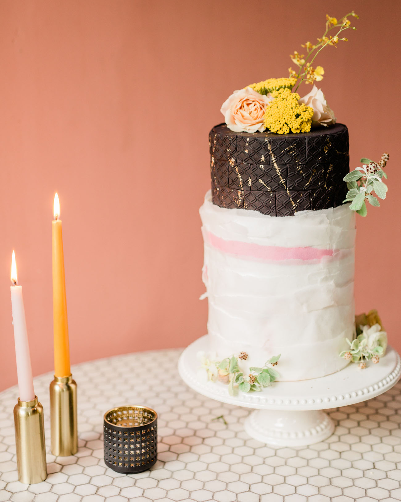 The wedding cake was textural and unique, with black and white parts and fresh blooms on top