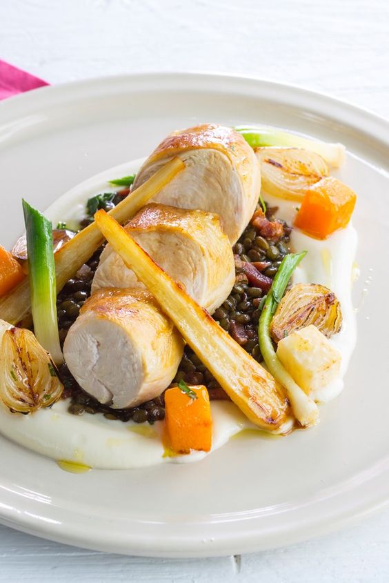 Pan fried chicken breast with lentils, baby leeks, baby onions, parsnips a la Francaise