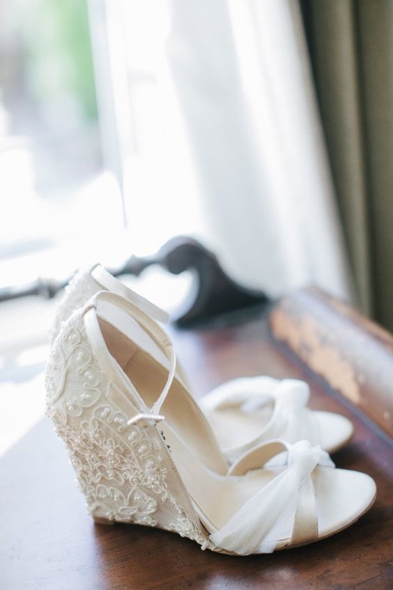 white wedding wedges with a lace embellished back and thin straps on the front