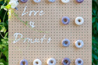 16 a donut wall is a trendy idea not only for a wedding but also for wedding-connected parties