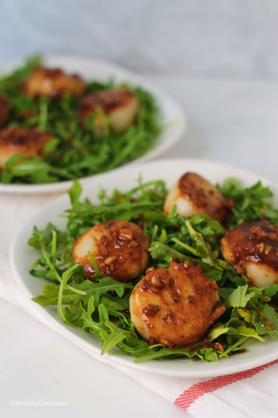 sea scallops over arugula with white wine garlic sauce is a fresh and not too hearty main course