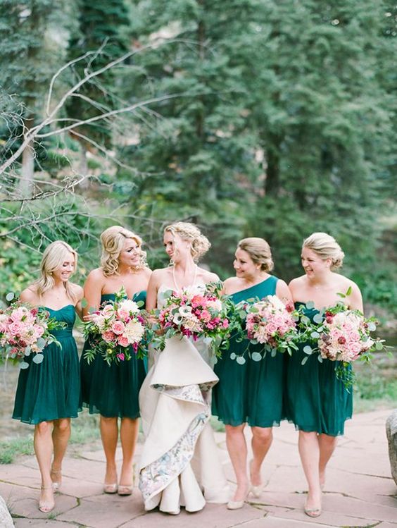 same emerald knee dresses and a one shoulder one for the maid of honor is a cool fall choice