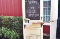 19 a rustic meets vintage wedding guest book – a vintage door that is to be signed and decorated by the guests