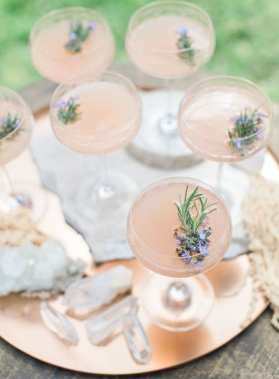 fresh lemonade with some edible flowers and herbs is sure to be a perfect sprign wedding signature drink