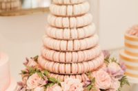 21 a delicate ombre macaron tower in blush with fresh blush blooms for decor