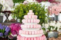23 a large ombre macaron tower from pink to purple is a hot idea for a modern wedding