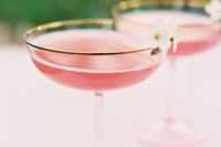 23 apple blossom cocktail with champagne, elderflower, rose water, apple-infesued vodka