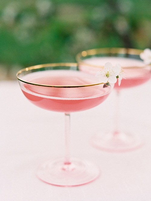 apple blossom cocktail with champagne, elderflower, rose water, apple-infesued vodka
