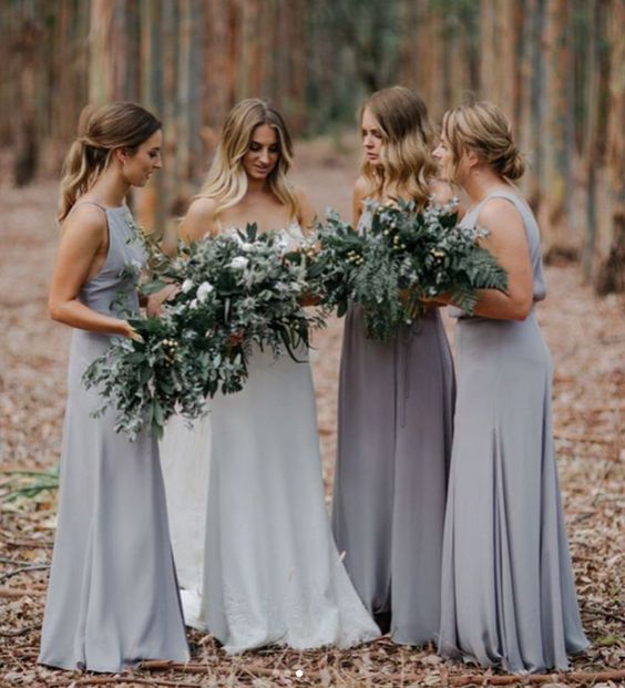 mismatching grey maxi dresses and a darker shade of grey for the maid of honor to highlight her look