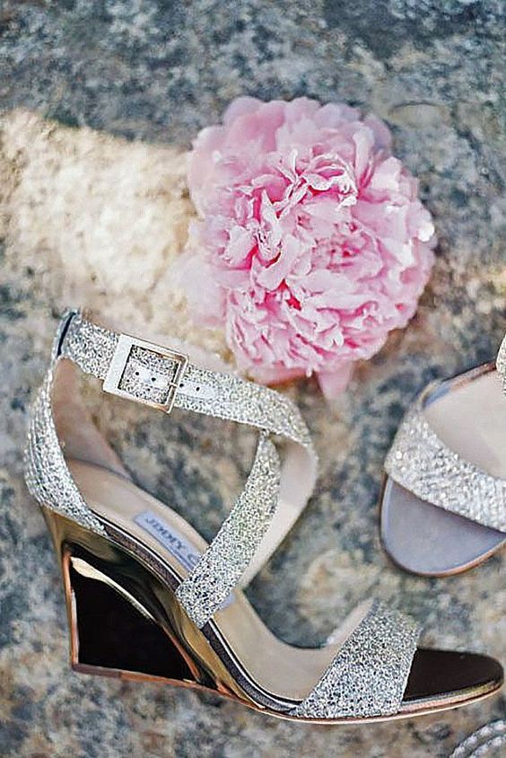 sparkling strappy wedges in silver with polished metal heels is a chic and glam idea