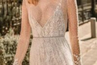 a lovely wedding dress, fully sheer and embellished, with a lace bodysuit under it is a very dreamy idea