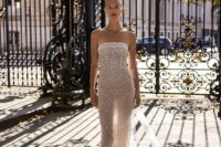 a modern strapless fully beaded naked wedding dress seems very minimal, airy and unsuual, it’s a fit for a glam bride