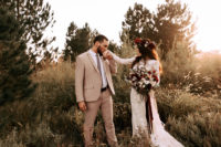 01 This at home Kansas wedding was done with neutrals, deep red hues and greenery plus earthy tones here and there