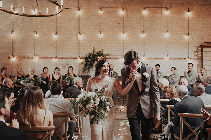 This gorgeous industrial wedding was filled with unique and personalized touches and featured cool decor