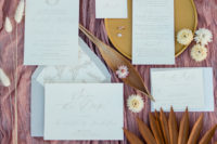 02 The wedding invitation suite was neutral, with calligraphy and perfectly featured breezy vibes of the day