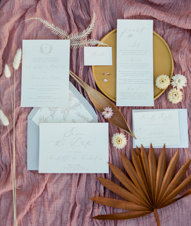 The wedding invitation suite was neutral, with calligraphy and perfectly featured breezy vibes of the day
