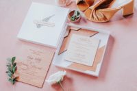 02 The wedding stationery suite was done with wood and plywood, with elegant calligraphy and boxes instead of envelopes