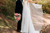 03 The bride was wearing a Sarah Seven gown with a lace bodice, a plain skirt with a front slit and a veil