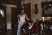 03 The bride was wearing a very romantic lace wedding gown with cap sleeves and a vintage feel, the groom was wearing a burgundy velvet tux