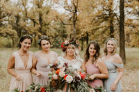 03 The bridesmaids were wearing mismatching pastel maxi gowns and carrying wreath bouquets with ribbons