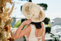 04 She added a hat with dried florals and leaves for a boho feel