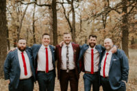 04 The groom was wearing a burgundy suit with a moody floral tie, the groomsmen opted for grey suits and red ties
