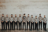 04 The groom was wearing a grey tux with black lapels and the groomsmen were wearing grey shirts with black pants and bow ties