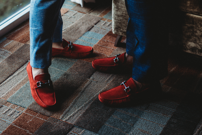 They were both wearing the same bright red loafers with no socks for effortlessly chic looks