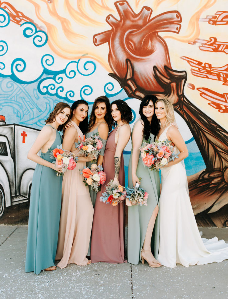 The bridesmaids were rocking mismatching pastel gowns