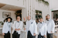 07 The groom and groomsmen were wearing white tuxedos